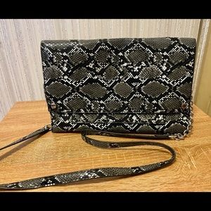 Steve Madden envelope crossbody purse.